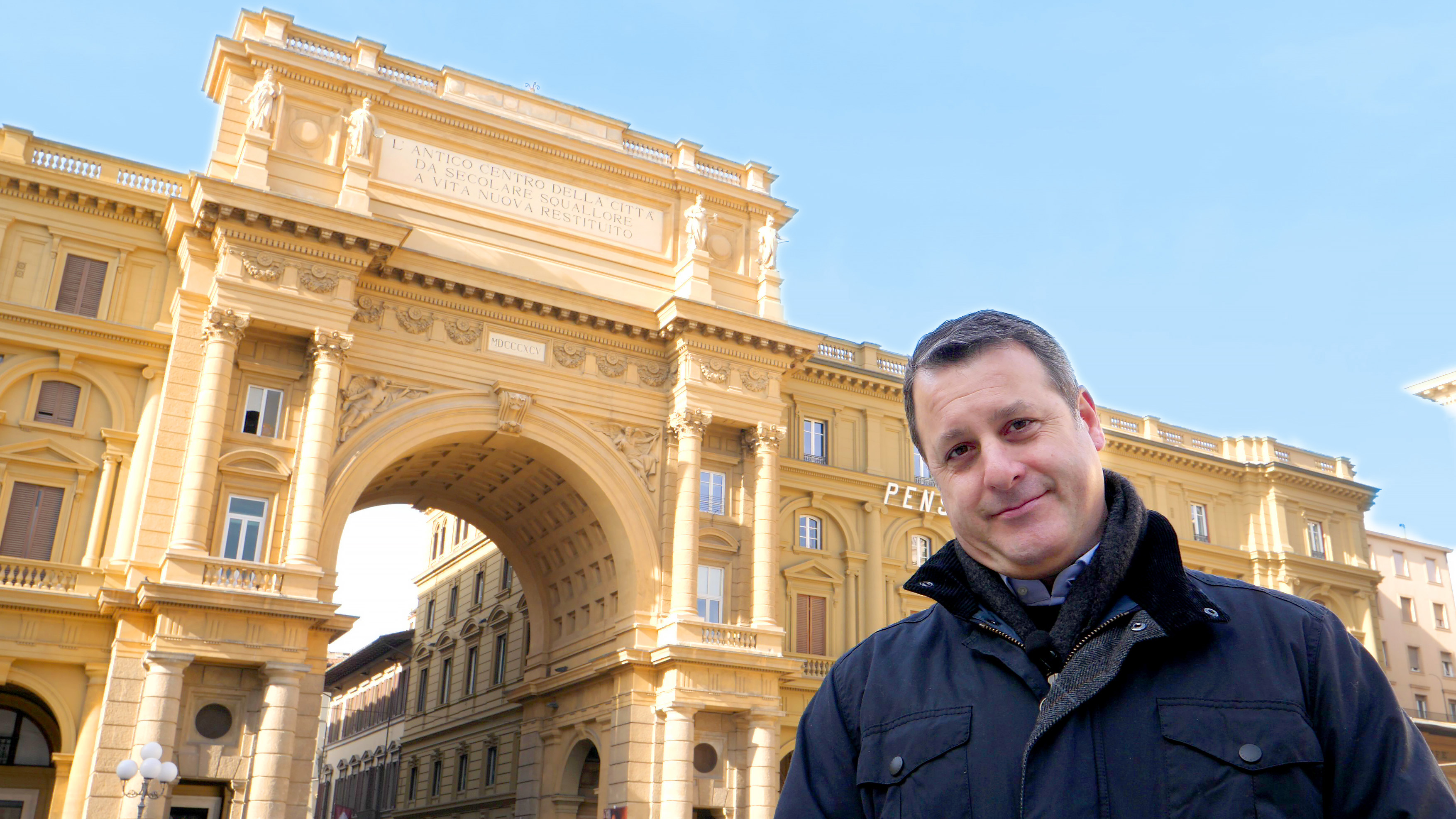 Dr. Rocky Ruggiero introduces the Piazza della Repubblica in Florence, Italy, where the history of Florence “begins and ends.”